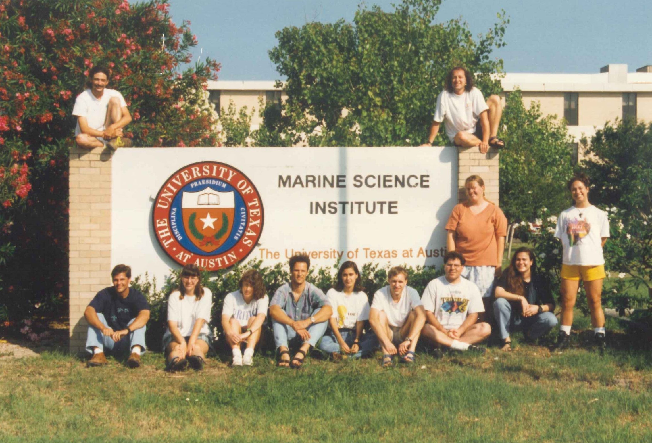 Students stand in front of the MSI sign