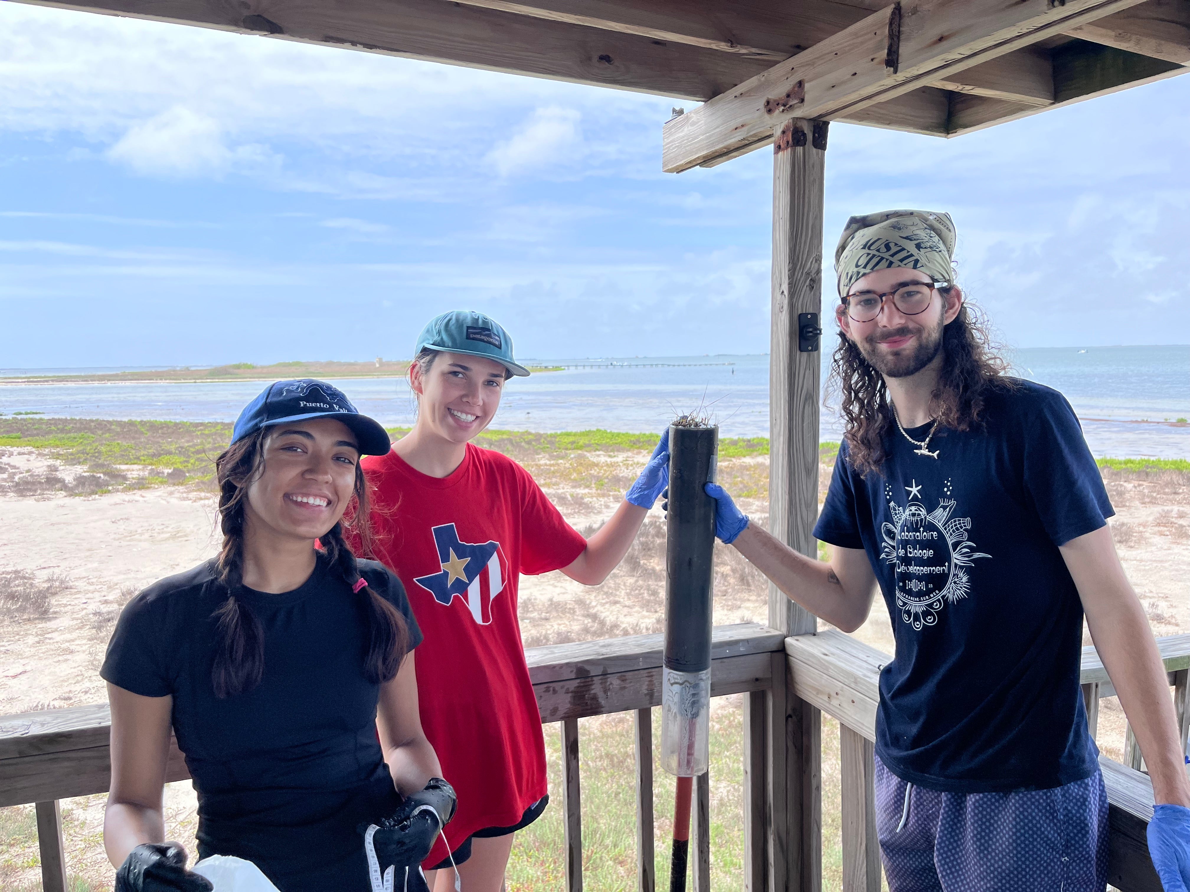 Semester by the Sea students holding a sediment sample. 